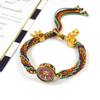 Fiasrel Tibetan-style multicolored cotton thread wristband