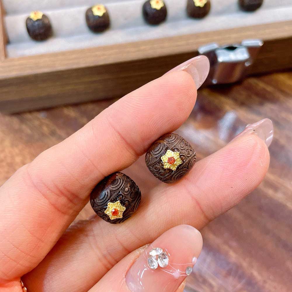 Fiasrel Silver-gilded agarwood patterned beads