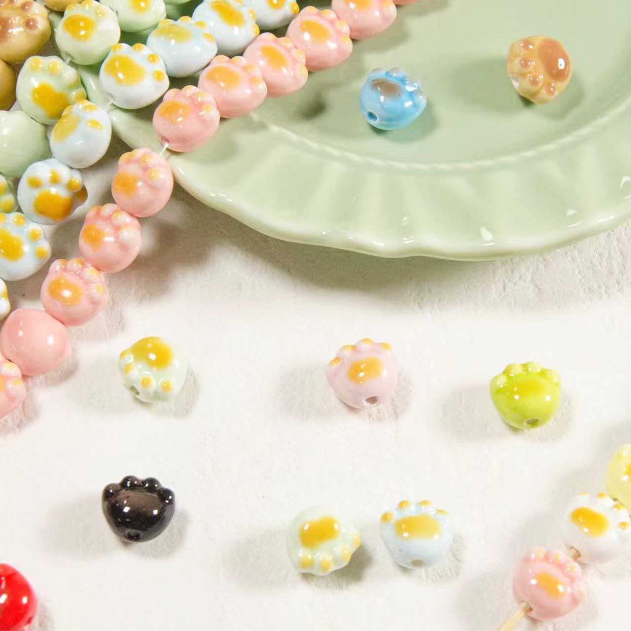 Fiasrel Colored glazed cat paw ceramic beads