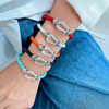 Fiasrel A horseshoe-studded studded woven bracelet