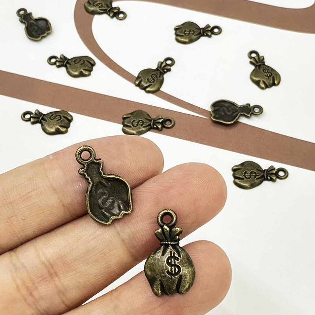 Fiasrel 20/100pcs Antique Bronze Mini US Dollar Sign Charms Vintage Money Bag Charms Beads for DIY Jewelry Making Handmade Craft Supplies