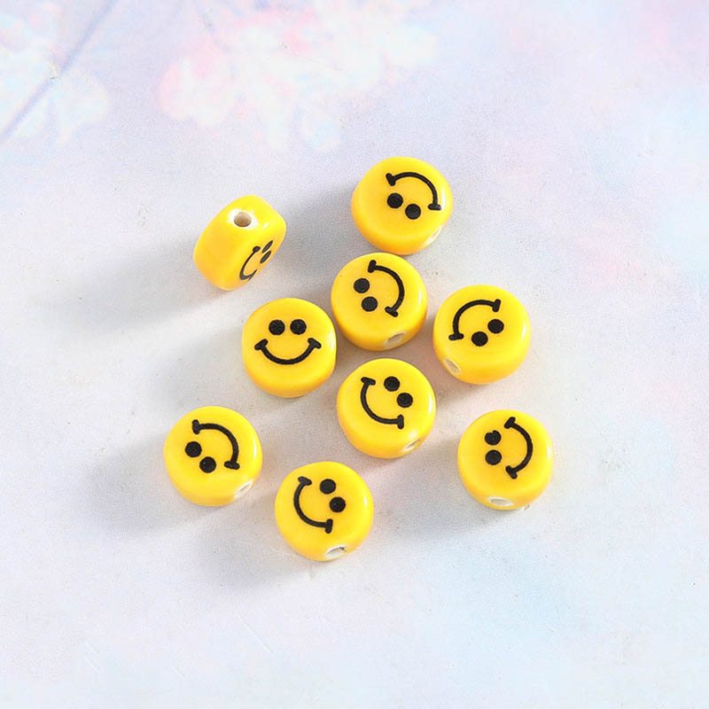 Fiasrel Flat and round smiling face ceramic beads