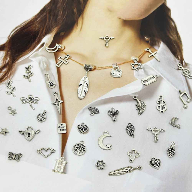 Fiasrel 50pcs 50 Types Vintage Metal Silver Alloy Charms Pendant for DIY Handmade Bracelets Neacklaces Earrings DIY Jewelry Accessories