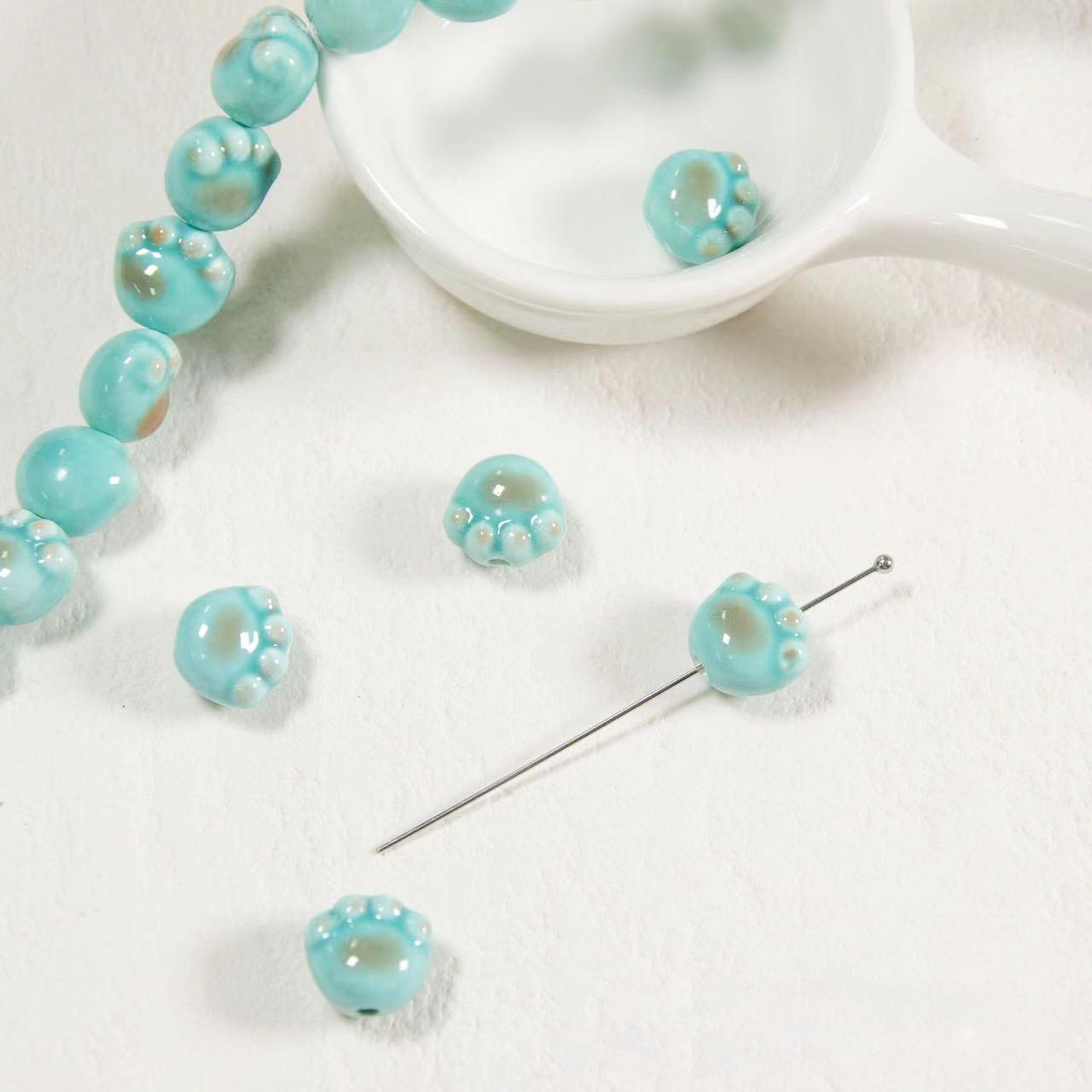 Fiasrel Colored glazed cat paw ceramic beads