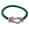 Fiasrel A horseshoe-studded studded woven bracelet