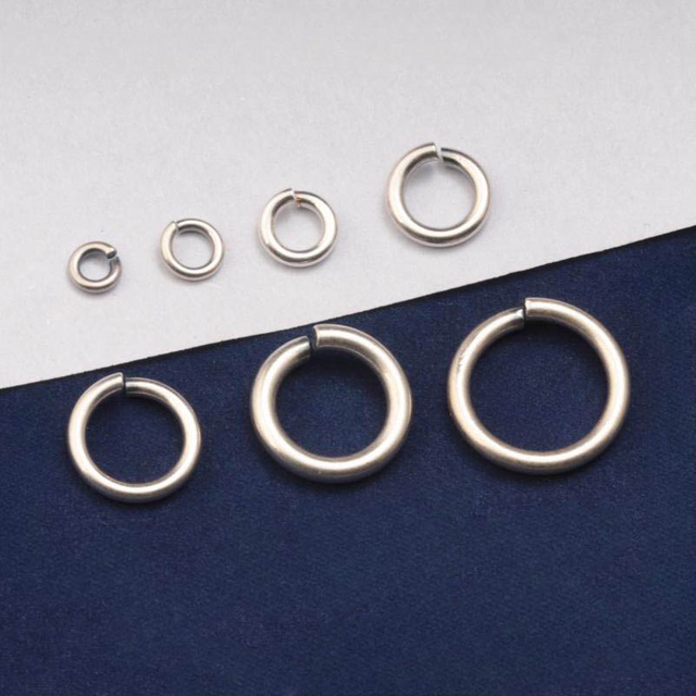 Fiasrel Gold and silver embroidered opening ring