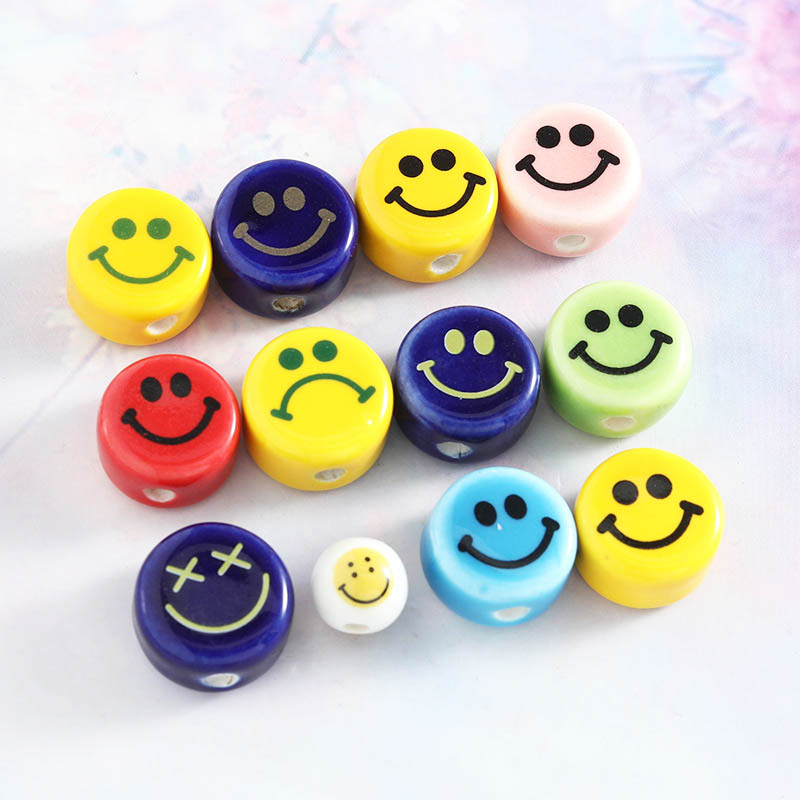 Fiasrel Flat and round smiling face ceramic beads