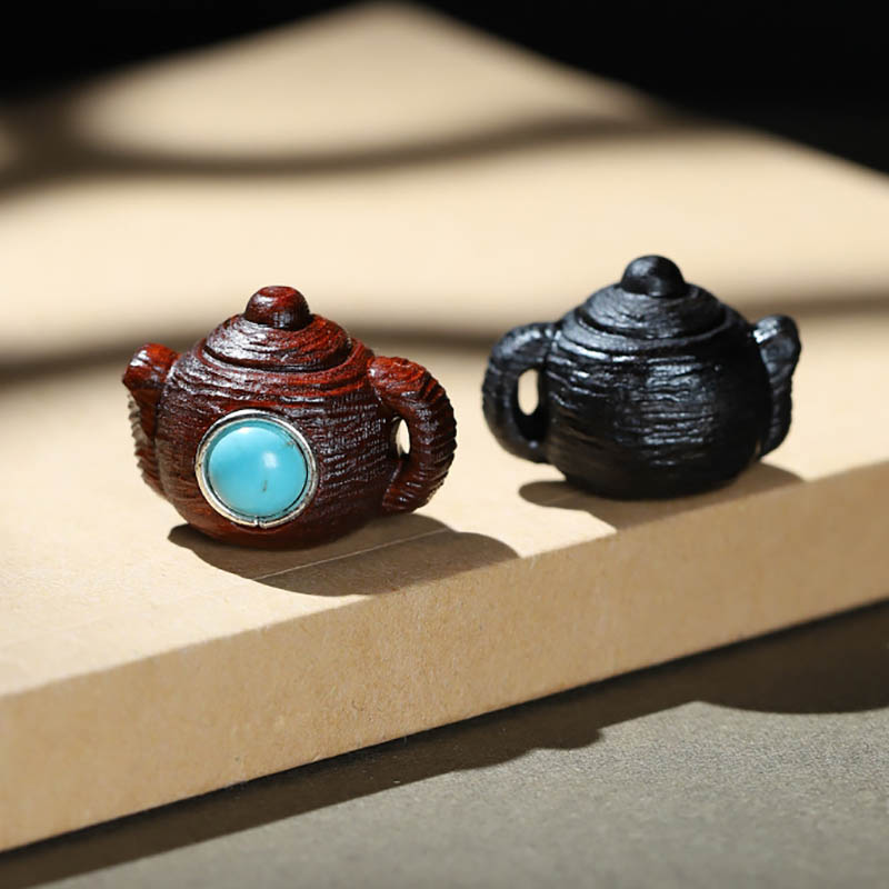 Fiasrel A teapot inlaid with agarwood
