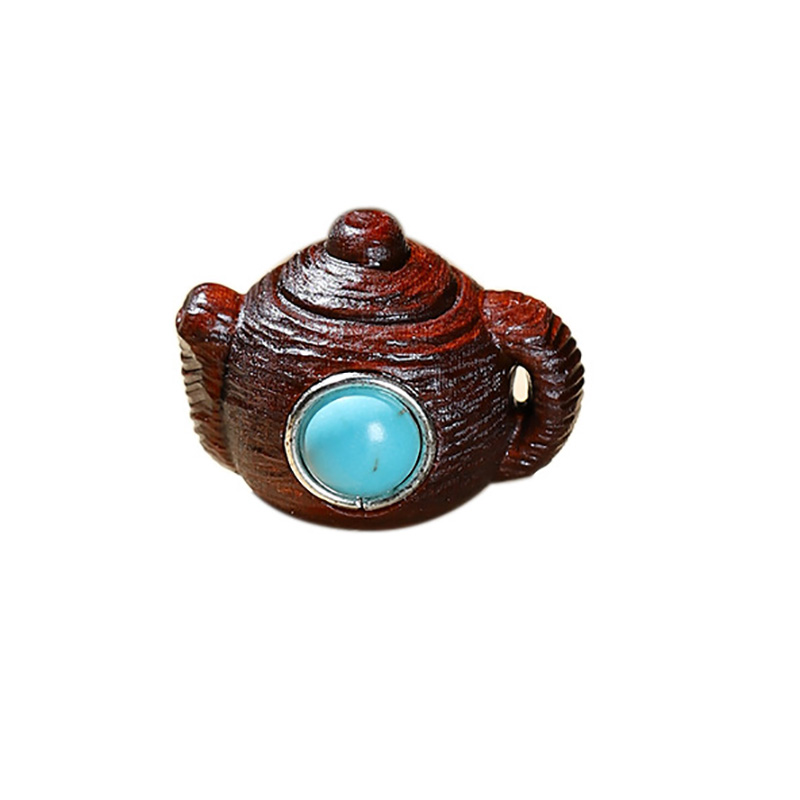 Fiasrel A teapot inlaid with agarwood