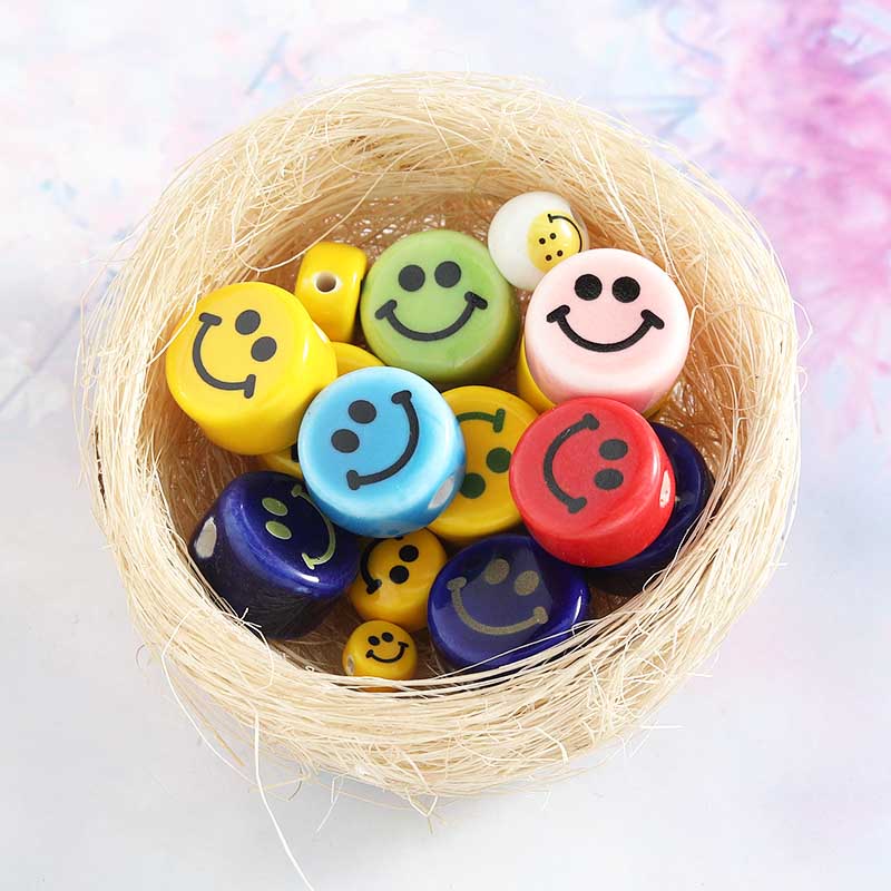 Fiasrel Flat and round smiling face ceramic beads