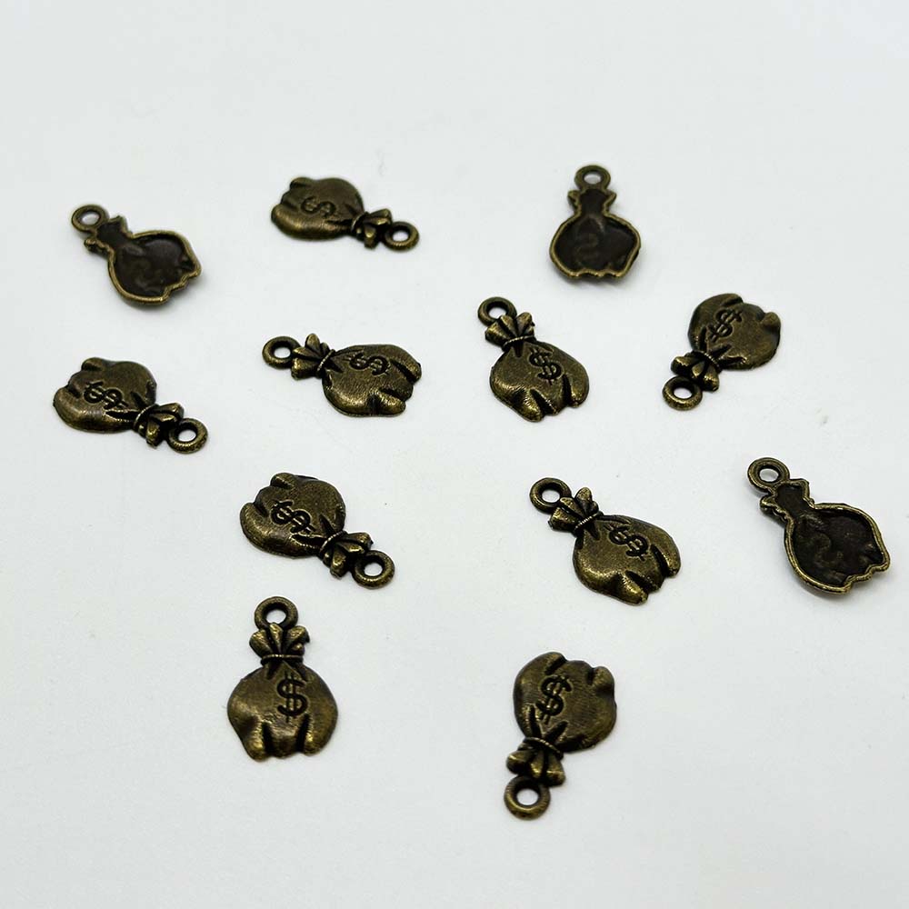 Fiasrel 20/100pcs Antique Bronze Mini US Dollar Sign Charms Vintage Money Bag Charms Beads for DIY Jewelry Making Handmade Craft Supplies